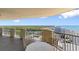 Outdoor patio with a table and chairs overlooking a breathtaking cityscape and waterfront view at 9994 Beach Club Dr. # 2403, Myrtle Beach, SC 29572
