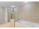 Modern bathroom featuring a glass enclosed shower and luxurious soaking tub at 9994 Beach Club Dr. # 2403, Myrtle Beach, SC 29572