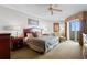 Cozy bedroom featuring two nightstands, and access to a private balcony at 9994 Beach Club Dr. # 2403, Myrtle Beach, SC 29572