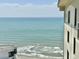 Breathtaking ocean view from a high-rise building, showcasing the serene beach and clear water at 9994 Beach Club Dr. # 2403, Myrtle Beach, SC 29572