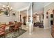 Elegant dining room adjacent to living area with decorative columns and stylish chandelier at 1004 Addington Ct., Murrells Inlet, SC 29576