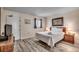 Cozy bedroom with a queen bed and neutral decor at 1012 N Waccamaw Dr. # 301, Garden City Beach, SC 29576