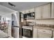 Kitchen with granite counters, stainless appliances, and island view at 1012 N Waccamaw Dr. # 301, Garden City Beach, SC 29576