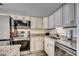 Kitchen with stainless appliances, granite counters, and pendant lighting at 1012 N Waccamaw Dr. # 301, Garden City Beach, SC 29576