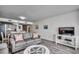 Serene living area with kitchen view, comfortable sofa seating and ocean-inspired decor at 1012 N Waccamaw Dr. # 301, Garden City Beach, SC 29576