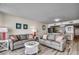 Inviting living area with comfortable sofas and nearby access to kitchen at 1012 N Waccamaw Dr. # 301, Garden City Beach, SC 29576