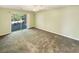 Bright bedroom with sliding door leading to an outdoor patio, perfect for enjoying fresh air and natural light at 1041 True Blue Dr. # 37A, Pawleys Island, SC 29585