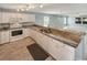 Well-equipped kitchen with modern appliances, granite countertops, and ample cabinet space, ideal for cooking and entertaining at 1041 True Blue Dr. # 37A, Pawleys Island, SC 29585
