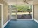 Relaxing sunroom with screens and a ceiling fan, perfect for enjoying the outdoors while staying protected from the elements at 1041 True Blue Dr. # 37A, Pawleys Island, SC 29585