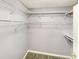 Spacious walk-in closet with white wire shelving, perfect for organizing your wardrobe and accessories at 1041 True Blue Dr. # 37A, Pawleys Island, SC 29585