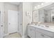 Bright bathroom featuring double sink vanity, and glass door shower at 1048 Longwood Bluffs Circle, Murrells Inlet, SC 29576