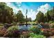 Picturesque park featuring a fountain, sculptures, and lush landscaping at 1048 Longwood Bluffs Circle, Murrells Inlet, SC 29576