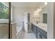 Bathroom features double vanity, modern lighting, soaking tub, and natural light at 1061 Edenton Dr., Calabash, NC 28467