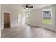 Bedroom with neutral paint, light floors, and natural light through windows at 1061 Edenton Dr., Calabash, NC 28467