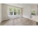 Sunny breakfast nook area featuring a large window with view of backyard landscaping at 1061 Edenton Dr., Calabash, NC 28467