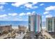 Stunning aerial view of Ocean One Resort on Myrtle Beach with amazing ocean views and crystal blue skies at 107 S Ocean Blvd. # 1001, Myrtle Beach, SC 29577
