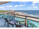 Relax on this balcony with seating and enjoy the beautiful ocean views from the comfort of your condo at 107 S Ocean Blvd. # 1001, Myrtle Beach, SC 29577