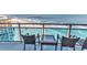 Enjoy ocean views from this condo balcony with comfortable seating and plexiglass railings at 107 S Ocean Blvd. # 1001, Myrtle Beach, SC 29577