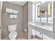 Modern bathroom featuring large mirror, ample counter space, and well-lit at 107 S Ocean Blvd. # 1001, Myrtle Beach, SC 29577