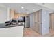 Cozy kitchen with stainless steel appliances, a tiled floor, and lots of cabinet space at 107 S Ocean Blvd. # 1001, Myrtle Beach, SC 29577