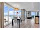 Inviting living room with beautiful beach views and an adjacent dining area at 107 S Ocean Blvd. # 1001, Myrtle Beach, SC 29577