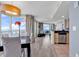 Open concept living area with beach views, tile/wood flooring, an eat-in kitchen, and a dining area at 107 S Ocean Blvd. # 1001, Myrtle Beach, SC 29577