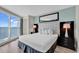 Comfortable main bedroom featuring ocean views and sleek decor at 107 S Ocean Blvd. # 1001, Myrtle Beach, SC 29577