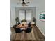 Dining room with a ceiling fan, table for six, and natural light at 109 Old Town Way # 4, Myrtle Beach, SC 29588