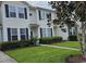 Inviting townhome with well-manicured lawn and lush landscaping, offering great curb appeal at 109 Old Town Way # 4, Myrtle Beach, SC 29588