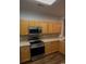 Kitchen featuring wooden cabinets, stainless steel appliances, and a countertop at 109 Old Town Way # 4, Myrtle Beach, SC 29588