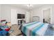 Bedroom with a queen sized bed, TV, dresser, and open door to bathroom at 1108 Blue Juniper Ct., Conway, SC 29527