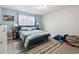 Bedroom featuring a queen sized bed, lamps, and a window at 1108 Blue Juniper Ct., Conway, SC 29527