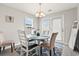 Cozy dining area with a round table and stylish chairs near the backyard exit at 1108 Blue Juniper Ct., Conway, SC 29527