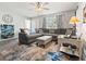 Spacious living room with lots of seating, bright light, and contemporary finishes at 1108 Blue Juniper Ct., Conway, SC 29527