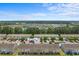 Aerial view of 1123 Fairway Lane townhome complex with green trees and blue sky at 1123 Fairway Ln. # 1123, Conway, SC 29526