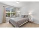 Bright bedroom with large window and two side tables at 1123 Fairway Ln. # 1123, Conway, SC 29526