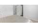 Bedroom featuring a carpet floor, a doorway leading to the bathroom, and a closet at 1123 Fairway Ln. # 1123, Conway, SC 29526