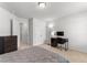 Bright bedroom featuring a desk, chair, and closet, perfect for study or relaxation at 1123 Fairway Ln. # 1123, Conway, SC 29526