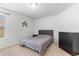 Well-lit bedroom featuring neutral colors, a queen-size bed, and a simple dresser at 1123 Fairway Ln. # 1123, Conway, SC 29526