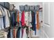Walk-in closet with metal shelving, and hanging rods for ample clothing storage at 1123 Fairway Ln. # 1123, Conway, SC 29526