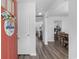 Welcoming entryway flows into the home with gorgeous floors and views to the kitchen and living spaces at 1123 Fairway Ln. # 1123, Conway, SC 29526