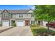 Charming townhomes boast attached garages, nicely landscaped yards, and covered front entryways at 1123 Fairway Ln. # 1123, Conway, SC 29526