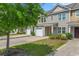 Charming townhomes boast attached garages, nicely landscaped yards, and covered front entryways at 1123 Fairway Ln. # 1123, Conway, SC 29526