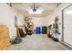 Well lit garage with storage, tools, and garage door with automatic door opener at 1123 Fairway Ln. # 1123, Conway, SC 29526