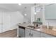 The gorgeous kitchen is equipped with stainless steel appliances, granite countertops, and stylish cabinetry at 1123 Fairway Ln. # 1123, Conway, SC 29526