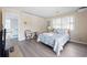 Cozy bedroom with beach-themed decor, including a starfish pillow and light coastal color scheme at 1184 Parker Dr., Pawleys Island, SC 29585