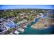 Stunning aerial view of a waterfront community with restaurants and docks, surrounded by lush greenery and waterways at 119 Brentwood Dr. # D, Murrells Inlet, SC 29576