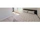 Cozy bedroom with a comfortable bed, neutral colors, wood-look flooring, and a closet at 119 Brentwood Dr. # D, Murrells Inlet, SC 29576