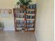 Community library with shelves full of books and decorative accents, perfect for a cozy reading spot at 119 Brentwood Dr. # D, Murrells Inlet, SC 29576