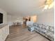 Inviting living space featuring a comfortable sofa, dining area, and seamless flow to the kitchen at 119 Brentwood Dr. # D, Murrells Inlet, SC 29576